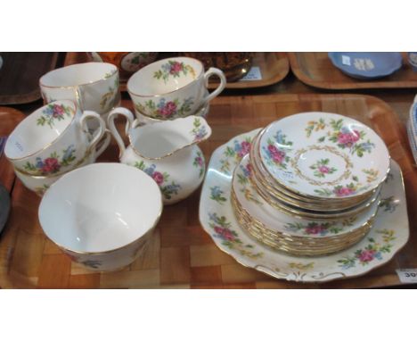 Tray of Royal Chelsea English bone china part tea ware items, overall decorated on a white ground with gilt and floral work c