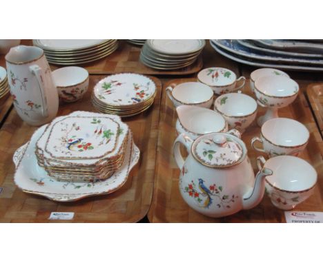 Two trays of Grafton china part tea ware items, overall decorate on a white ground with gilt banding and birds amongst foliag