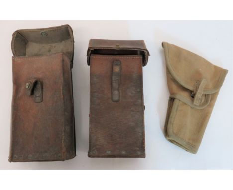 Two 1939 Pattern 1st Pattern Utility Ammunition Pouchesrectangular, brown grained leather pouches with riveted seams.  Top fl