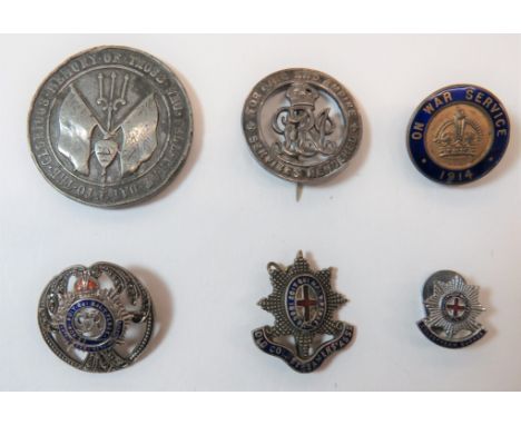 Small Selection of Various Itemsconsisting WW1 Silver Services Rendered badge numbered "B86573" ... Cast white metal WW1 Jutl