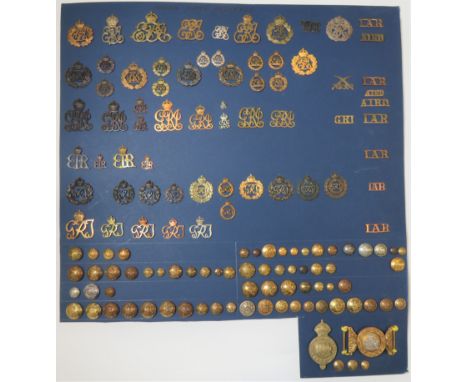 Indian Army Insignia.  Good scarce interesting selection mounted on large card. Includes head-dress badges, collar badges, sh