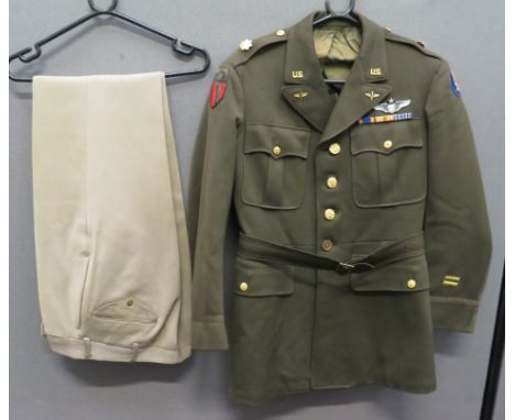 American Major Senior Pilot's Uniformkhaki green, single breasted, open collar tunic.  Pleated chest and lower hidden pockets