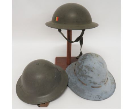 Two MKII Steel Helmets And A Civil Defence Steel Helmetconsisting green repainted helmet.  The brim with 3 drilled holes to e