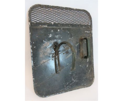 Early Post War British Army Riot Shieldblack painted, rectangular alloy shield.  The top with mesh visor.  Rear fitted with g