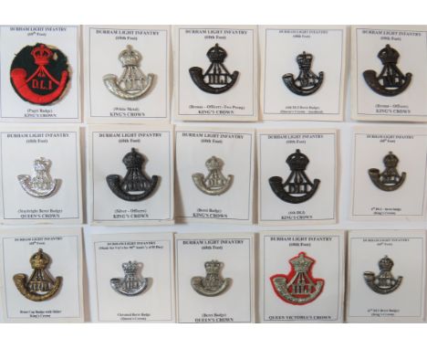 Durham Light Infantry Cap Badgesincluding white metal Tudor crown, lugs ... Sterling silver KC, lugs ... Bronzed KC, 2 blades
