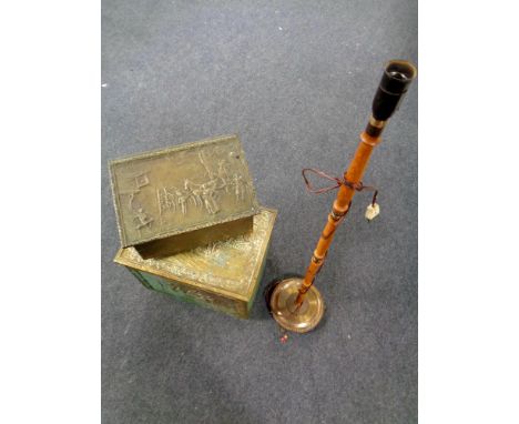 A brass embossed coal box and slipper box together with a twentieth century standard lamp