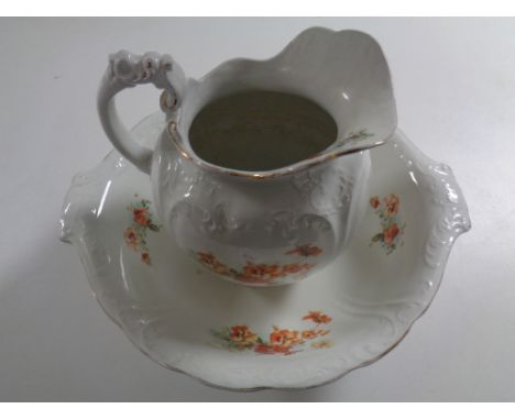 A Victorian Burslem floral patterned wash jug and basin  