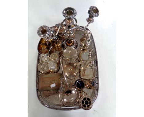 A silver plated twin handled serving tray together with a large quantity of assorted plated wares to include cigarette box, l