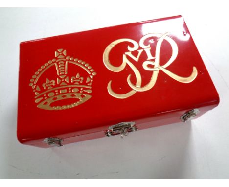 A metal storage case initialed G R  
