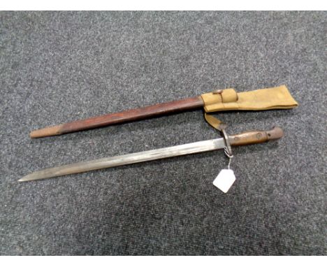 A British World War I bayonet in scabbard  