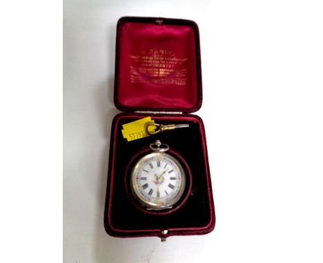 A silver fob watch with enamel dial and key in box 