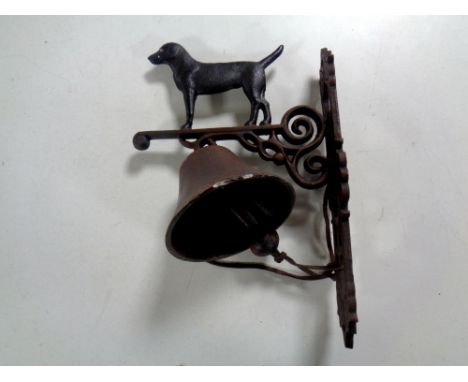 A cast iron labrador wall bracket with bell 