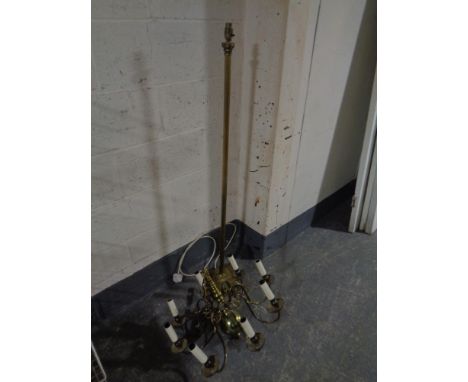 A brass Corinthian column standard lamp together with a further brass eight way light fitting 