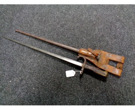 A French World War I bayonet in scabbard  