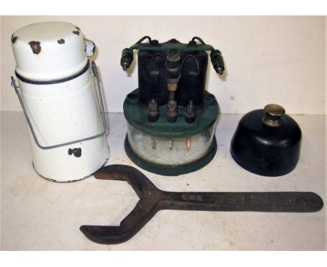 A Miscellaneous Lot which includes an early GWR Signal Box Relay. Drivers Enamel Billy Can. GWR Bakelite Shelf Plunger and a 