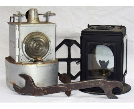 A Lot containing an early GWR signal lamp interior stamped GWR READING. LMS signal lamp interior. LNWR stamped spanner with u