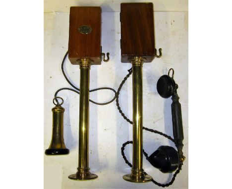 A Midland Railway shelf mounted Box to Box candlestick telephones with handset and a North Eastern railway example with liste