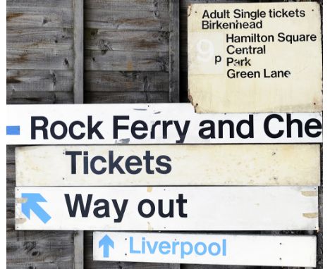 A lot containing 5 x modern railway direction signs. ROCK FERRY. TICKETS. WAY OUT with arrow. LIVERPOOL. Together with a wall