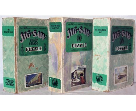 3 x GWR Jigsaw puzzles in green boxes. THE NIGHT MAIL in poor box. THE MODEL RAILWAY vendor's note within box states COMPLETE