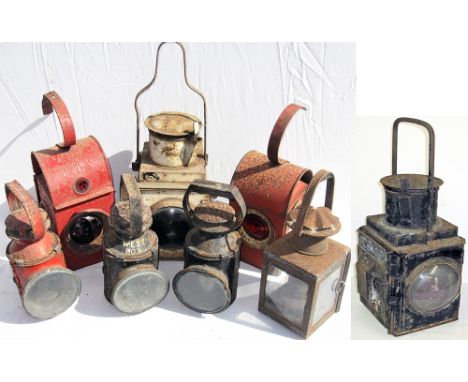 A Lot containing various railway lamps to include 3 x BR standard handlamps. 2 x road style red oil lamps, one embossed BR. B