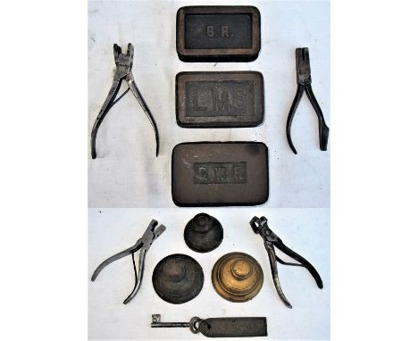 A Lot containing office paperweights and ticket clips. 4 x ticket clips, one stamped LMS. 6 x paperweights to include BR, GWR