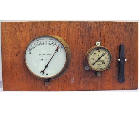 Two Pressure Gauges. BR 0 - 250 PSI and SR 0 - 150 PSI together with a GCR stamped metal chisel all mounted onto a wooden boa