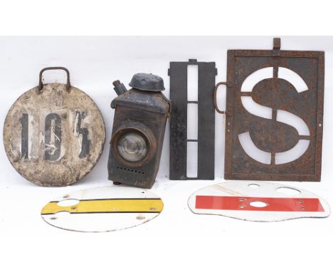 A Lot containing miscellaneous signalling items. 2 x ground enamel signal discs. LMS Signal Lamp case. Southern Region Head C