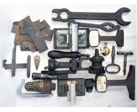 A Lot containing several miscellaneous railway parts mainly tools, carriage keys, GWR Gauge glass spanner. Track training aid