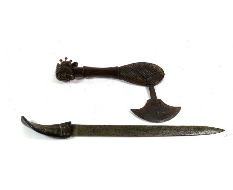 A Luba Type Ceremonial Axe, the crescent shape blade with rectangular tang engraved with feathered leaves, with figural carve