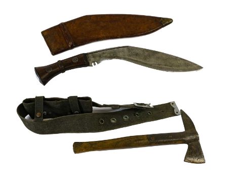 A Second World War Kukri, the 30.5cm curved steel blade stamped K 45 below a broad arrow at the ricasso, with a narrow fuller