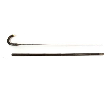 An Early 20th Century Spanish Swordstick, the 76cm doubel edge steel blade engraved ABT. FAB.DE TOLEDO 1904, the dark brown f