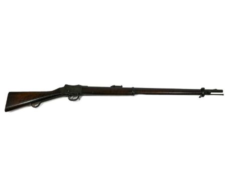 A Martini Henry Mark IV Class I Long Lever Single Shot Service Rifle, .450 calibre, the 84cm round steel barrel with blade an