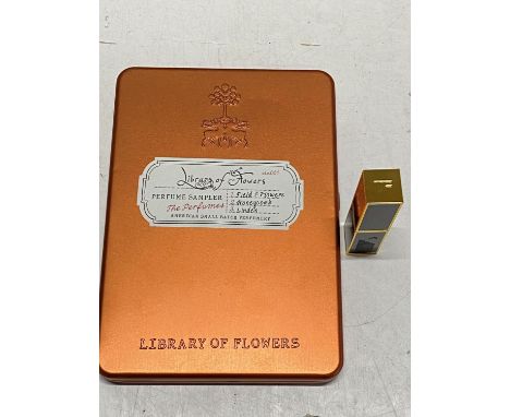 A library of flowers perfume sampler set and a TF lipstick