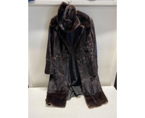 A vintage ladies fur coat and hat (slight wear to parts of the hem)by Sylvia/Charles Batten