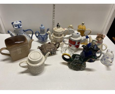 A job lot of assorted novelty teapots including Leeds Cream Ware, Tony Carter, Carlton Ware, Wade etc shipping unavailable