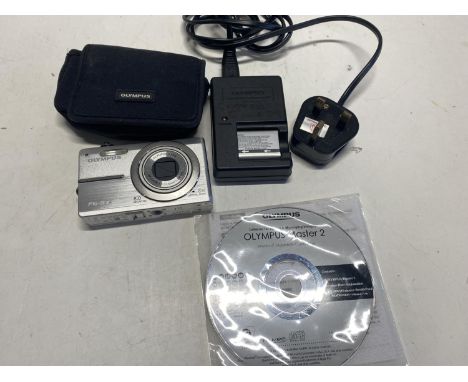 A Olympus FE - 370 digital camera with charger and battery (untested)