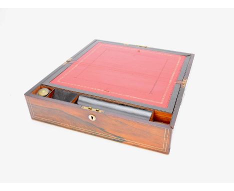 A Victorian rosewood and mother-of-pearl writing slope, inlaid with stringing, roundels and foliate motifs, minor damage, 41c