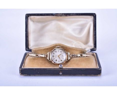 Avia: A lady's 9ct gold bracelet watchDate: Circa 1957Movement: 15-jewel, manual windDial: Silver, gilt Arabic and baton hour