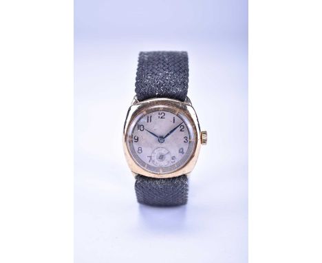 A Gentleman's 9ct gold wristwatchDate: Circa 1936Movement: 15-jewel, manualDial: Silvered with gilt minute track, black Arabi
