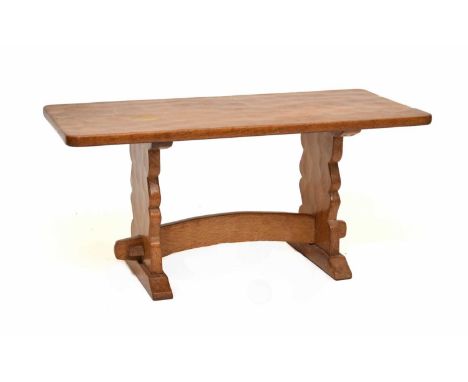 An Old Mill, Thirsk, light oak coffee table, the plain adzed top raised on shaped supports united by an arched stretcher, 94c