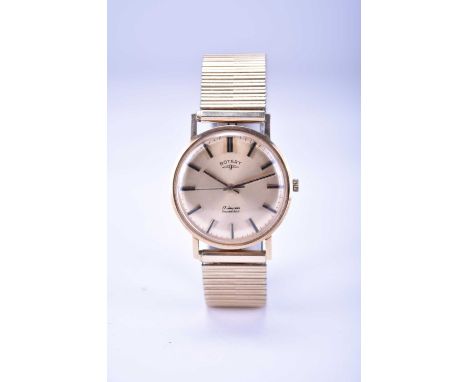 Rotary: A gentleman's 9ct gold wristwatchDate: 1960sMovement: 17-jewel, manualDial: Brushed gold, gold and black baton hour m