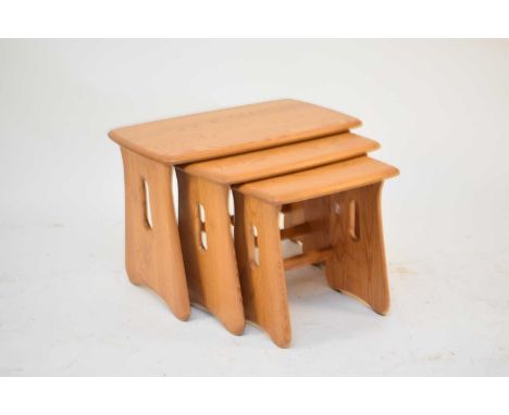 An Ercol blond ash nest of three tables, Windsor range, largest 63cm wide x 41cm deep x 45cm high.Negligible signs of age and