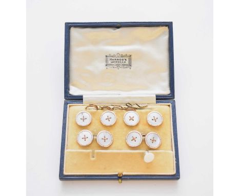 A cased set of enamel and mother of pearl cufflinks and studs, comprising; a pair of cufflinks and four studs, the mother of 