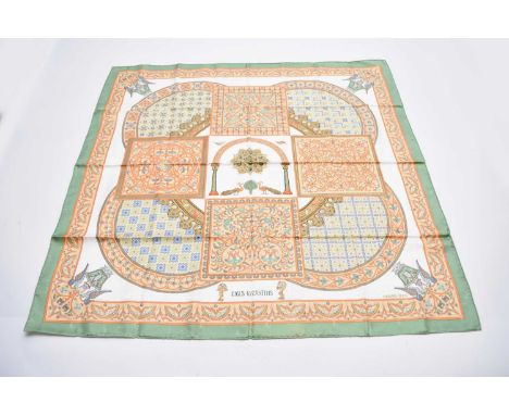A Hermes silk 'Ciels Byzantins' print scarf, designed by Julia Abadie, incorporating a central arch surrounded by geometric p