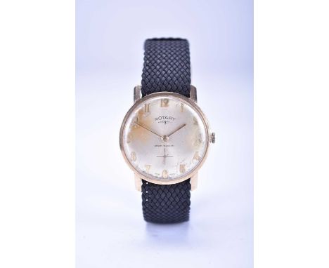 Rotary: A gentleman's 9ct gold wristwatchDate: Circa 1964Movement: Cal.330 15-jewel, manualDial: Brushed gold, gold Arabic ho