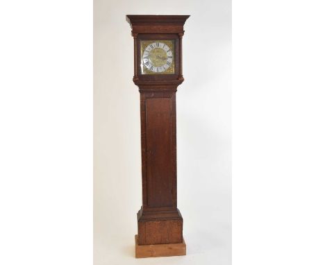 An 18th century oak 30hr brass dial longcase clock by Thomas Dicker of Silchester, the hood with ogee cornice above a plain f