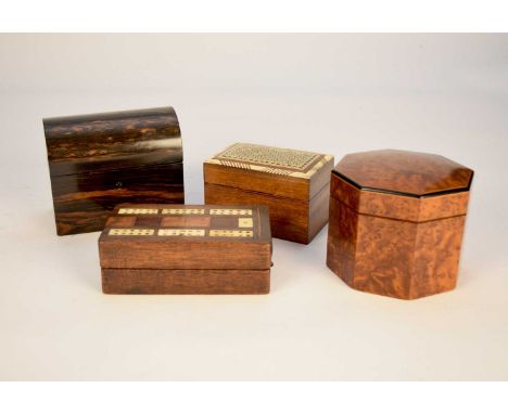 An assembled group of wood boxes to include: A dome-top coromandel perfume casket with glass bottles; an octagonal ebony-stru