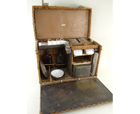 VINTAGE DREW & SONS WICKER PICNIC HAMPER, c. 1920s, fitted with enamel and electroplated dishes, containers etc., initials to
