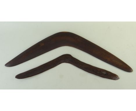 TWO AUSTRALIAN ABORIGINAL BOOMERANGS, one asymmetric with adzed faces, probably for bird-hunting, the other a larger fighting