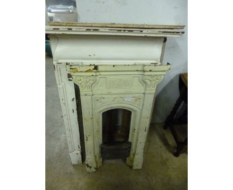 A PAINTED CAST IRON BEDROOM FIREPLACE, and a similar smaller fireplace (no shelf) (2)